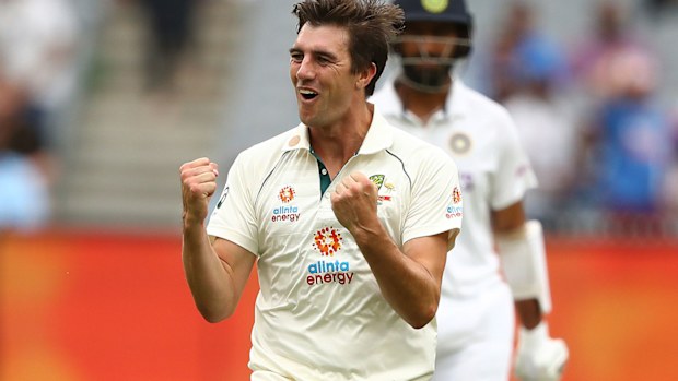 Pat Cummins celebrates the wicket of Cheteshwar Pujara at the MCG.
