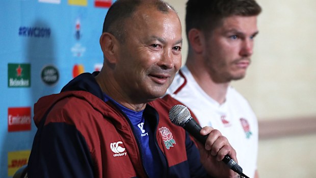 Eddie Jones, (L) the England head coach faces the media with team captain Owen Farrell 
