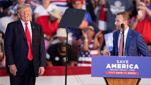 Donald Trump on stage with congressional candidate Max Miller.