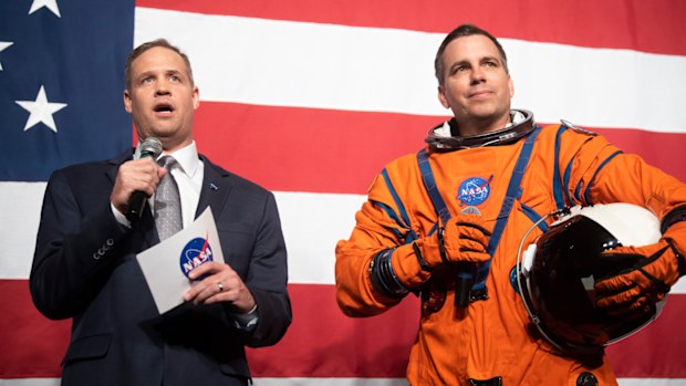 NASA administrator Jim Bridenstine, left, speaks during a demonstration by Dustin Gohmert, wearing a NASA spacesuit prototype for lunar exploration, launch and re-entry aboard the agency's Orion spacecraft, known as the Orion Crew Survival Suit.