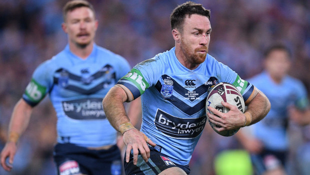 James Maloney runs the ball for the Blues.