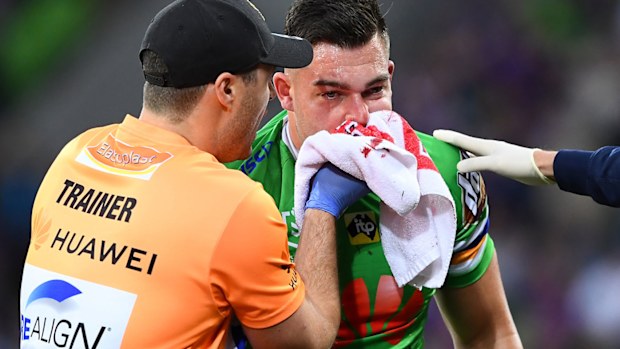 Nick Cotric cuts his face