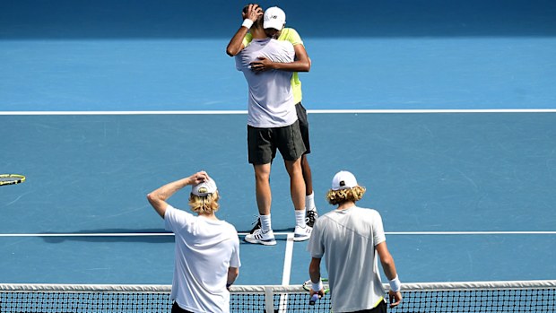 Joe Salisbury of Great Britain and Rajeev Ram of the USA celebrate after winning the men's doubles final against Luke Saville and Max Purcell 