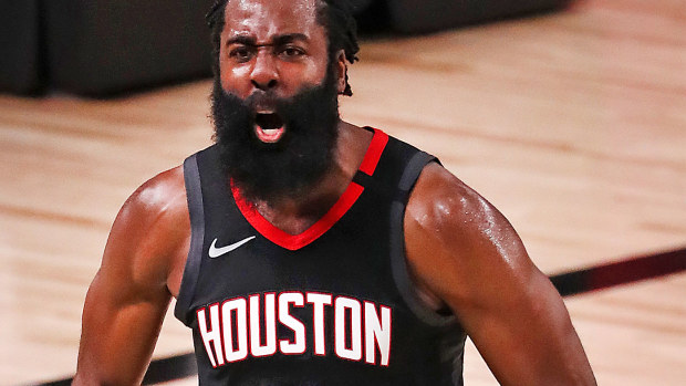 James Harden #13 of the Houston Rockets reacts during the fourth quarter 