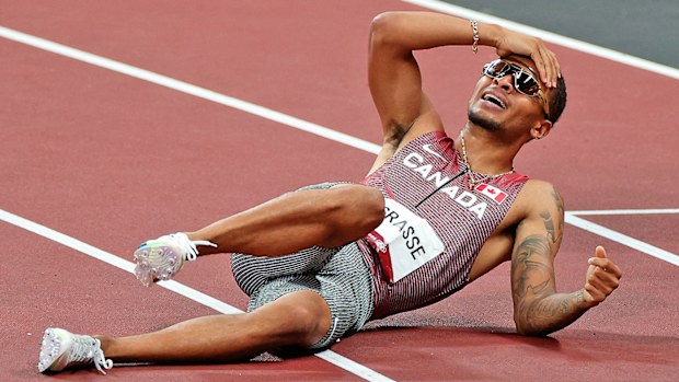 Andre De Grasse of Team Canada celebrates winning the Men's 200m Final 