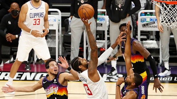 Paul George #13 of the LA Clippers goes up for a shot against the Phoenix Suns during the second half in Game Five of the Western Conference Finals