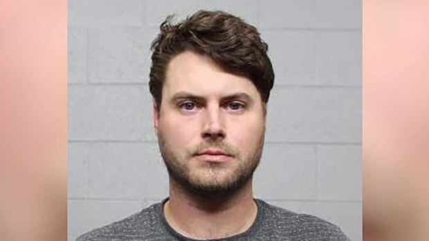 James Clayton Cholewinski-Boy was charged with abusive sexual contact after Tuesday's reported assault aboard American Airlines Flight 807 from Charlotte, North Carolina, to Salt Lake City, Utah, the complaint said.