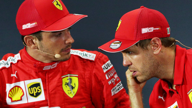 Ferrari teammates Charles Leclerc (left) and Sebastian Vettel.
