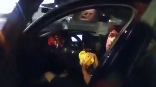 The officer opened the door without warning with his gun already pointed.