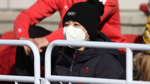 Chinese tennis player Peng Shuai looks on during the Women's Freestyle Skiing