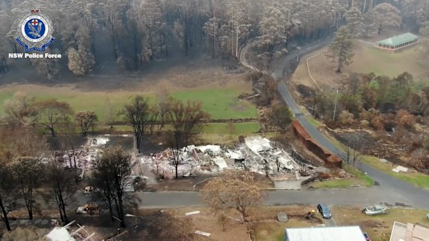 A NSW Police drone films a building destroyed by fire.