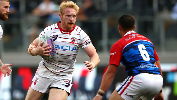James Graham of England runs the ball during the round three Rugby League World Cup 9s match between France and England