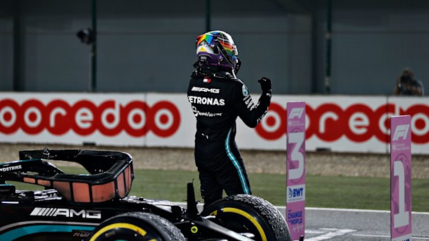Lewis Hamilton of Great Britain and Mercedes GP celebrates in parc ferme