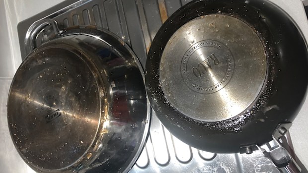 Dishwasher tablet cleaning hack for burnt pans