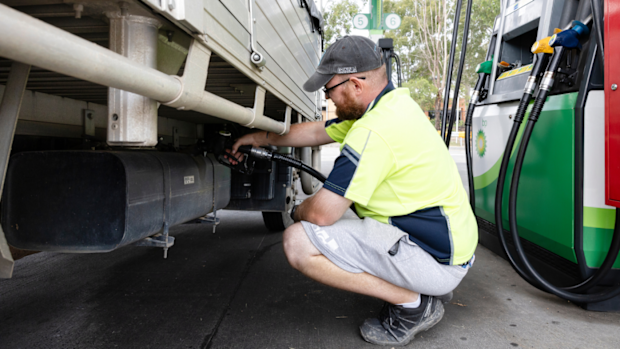 A truck driver who does deliveries locally fills up every day after work with diesel at BP Minchinbury in Sydney. 19 March 2026.