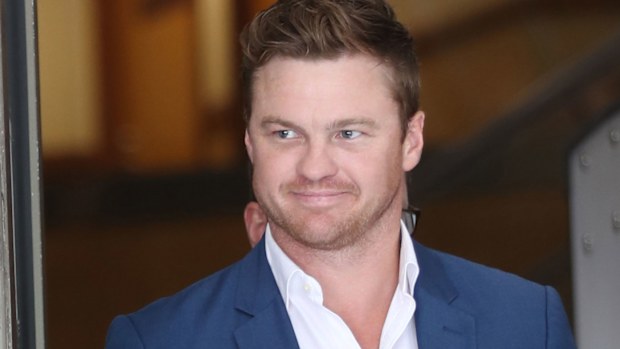 Former AFL player Colin Sylvia leaves the Magistrates court in Melbourne.