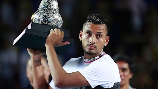 Nick Kyrgios pictured lifting the title in Acapulco after beating Alexander Zverev in the 2019 Mexican Open