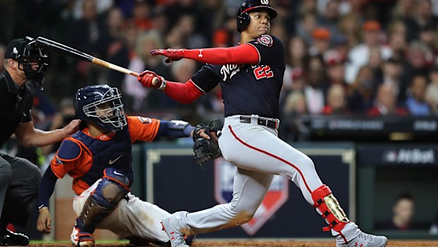 Juan Soto #22 of the Washington Nationals hits an RBI single 
