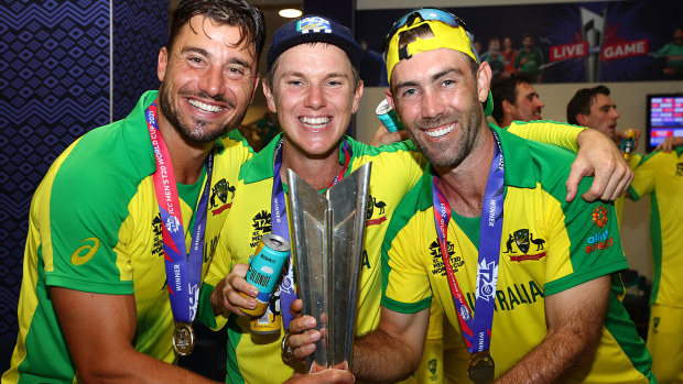 Marcus Stoinis, Adam Zampa and Glenn Maxwell of Australia celebrate following the ICC Men's T20 World Cup final 