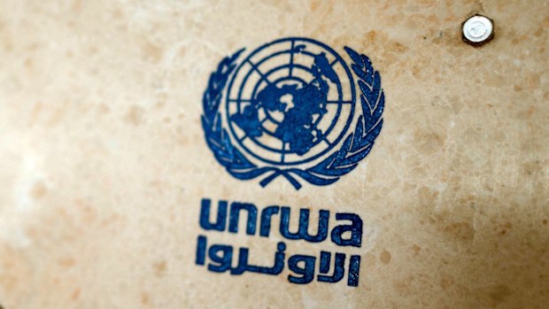 UNRWA's lettering on a sign at the girls' school in the Talibeh refugee camp