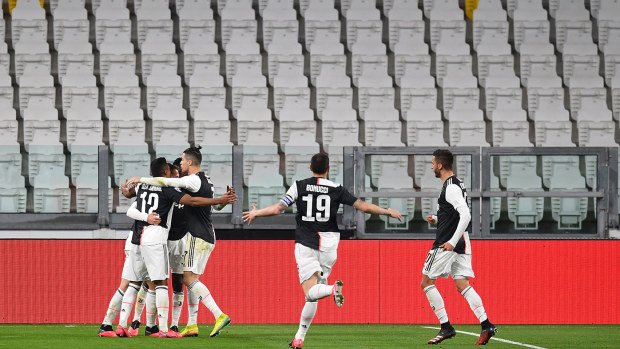 Aaron James Ramsey (L) of Juventus celebrates the opening goal with team mates during the Serie A match between Juventus and FC Internazionale at Allianz Stadium
