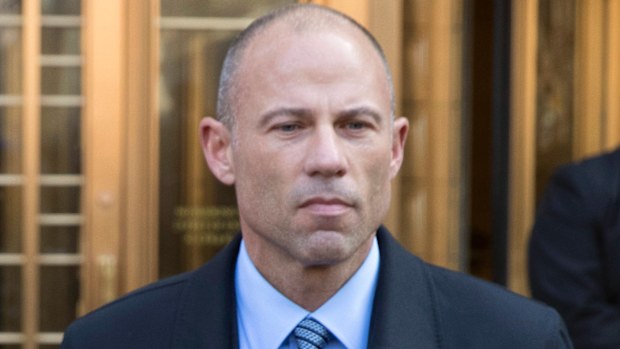 Michael Avenatti listens outside federal court, Monday, April 16, 2018, in New York. (AP Photo/Mary Altaffer)