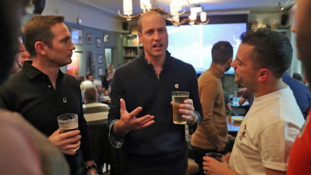 Frank Lampard and Prince William, Duke of Cambridge join football fans who have been supported by mental health charities Mind and CALM to watch the England vs Czech Republic match at the Prince Albert pub on October 11, 2019 in London, England