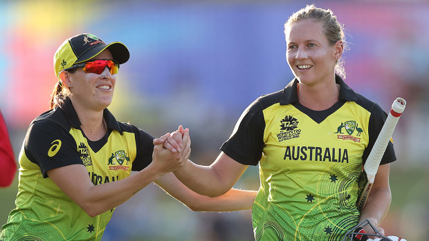 Meg Lanning of Australia celebrates with Megan Schutt 
