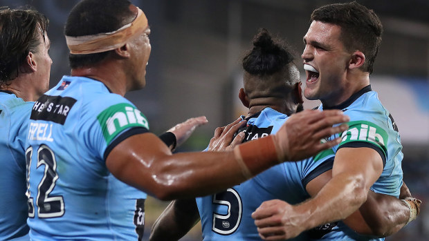 Nathan Cleary of the Blues celebrates with Josh Addo-Carr 