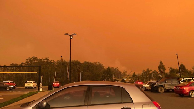 A photo red skies above the carpark at the Port Macquarie highway McDonalds when the bushfire threat emerged on November 8. 