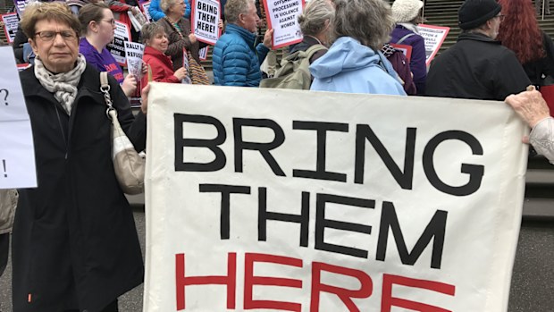 Protesters gathered outside Parliament House in Melbourne last month, protesting against cuts to asylum-seeker welfare payments