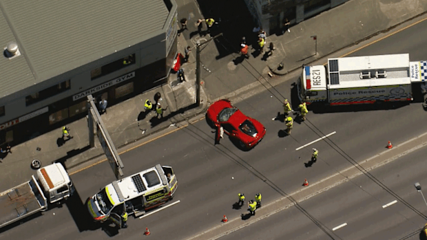 A Ferrari crashed into a power pole in St Peters Princes Highway