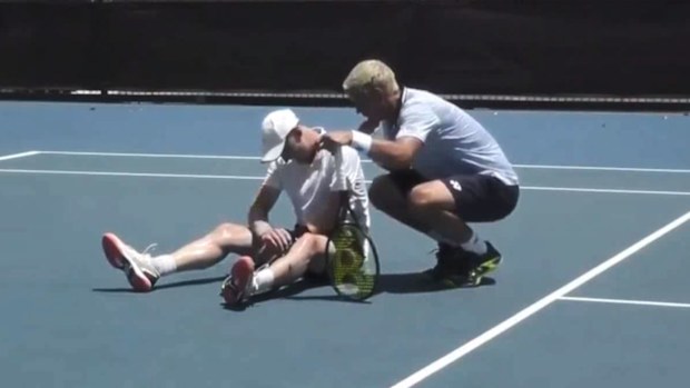 Bolt's comforts Mott after his unfortunate injury
