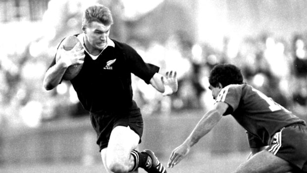 New Zealand All Blacks winger John Kirwan gets around centre Gary Ella during a tour match against Sydney club Randwick on 22 June 1988.