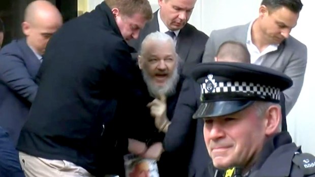 WikiLeaks founder Julian Assange is dragged out of the Ecuadorian embassy.