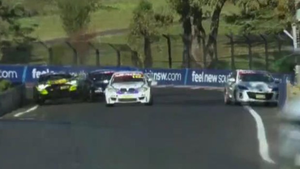 Grant Denyer made contact with a rival during the Bathurst 6hr, before both crashed heavily into the concrete wall.
