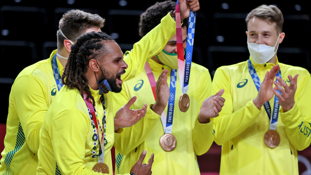 Patty Mills of Team Australia celebrates with his bronze medal during the Men's Basketball medal ceremony 