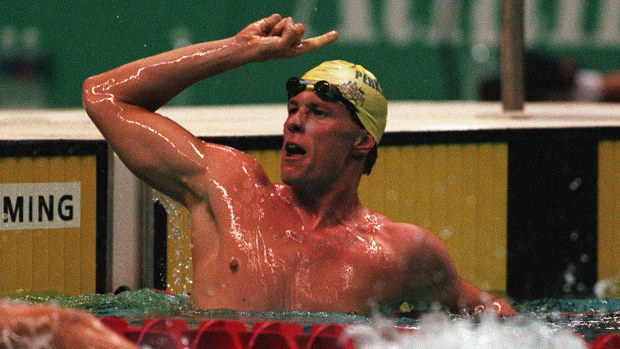 Kieren Perkins celebrates victory in the 1500m freestyle at the Atlanta Olympics.
