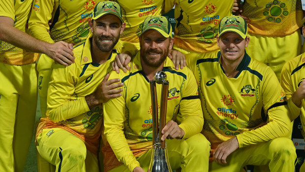 Glen Maxwell, Captain Adam Finch and Steve Smith with the Chappell-Hadlee trophy during game three of the One Day International Series between Australia and New Zealand at Cazaly's Stadium on September 11, 2022 in Cairns, Australia. (Photo by Emily Barker/Getty Images)