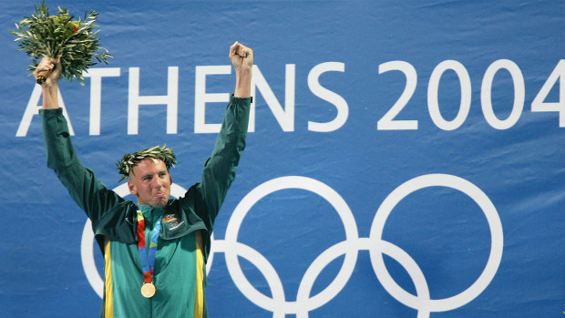 Grant Hackett celebrates winning gold in the men's 1500m freestyle at the Athens 2004 Olympics.