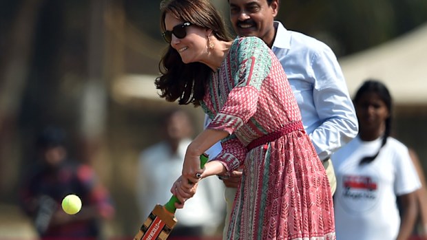  The Duchess of Cambridge playing cricket during a visit to the Oval Maidan recreation ground in Mumbai. (AAP)