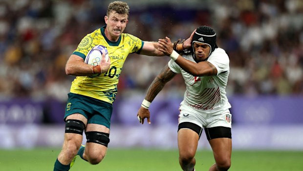 Nick Malouf running the ball for Australia.