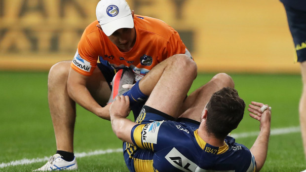 Eels star Mitchell Moses is treated for a calf injury in Parramatta's win over Canberra.