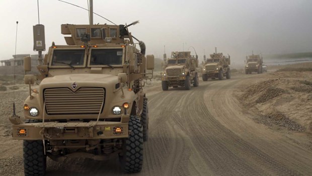Iraqi security forces in Qayara. (AP)
