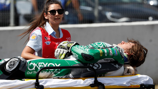 Remy Gardner is taken away on a stretcher after a horror crash in Spain.