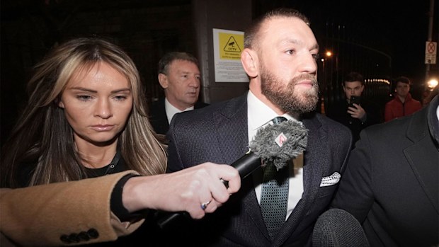 Conor McGregor and partner Dee Devlin leave the High Court in Dublin, Ireland.