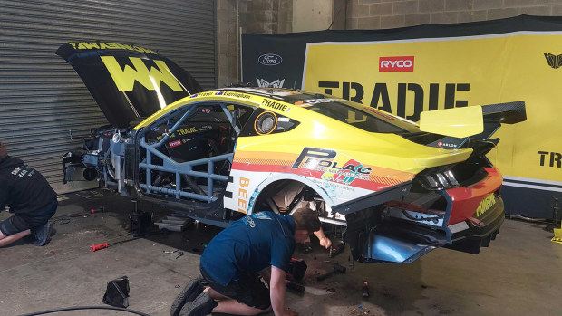 Tickford Racing working on the damaged car of Declan Fraser.