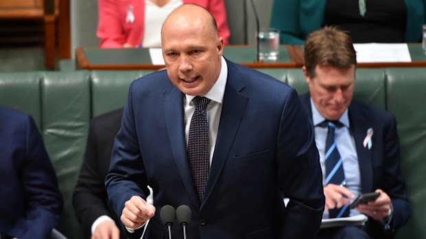 Minister for Home Affairs Peter Dutton during Question Time in the House of Representatives at Parliament House in Canberra, Tuesday, October 15, 2019. 