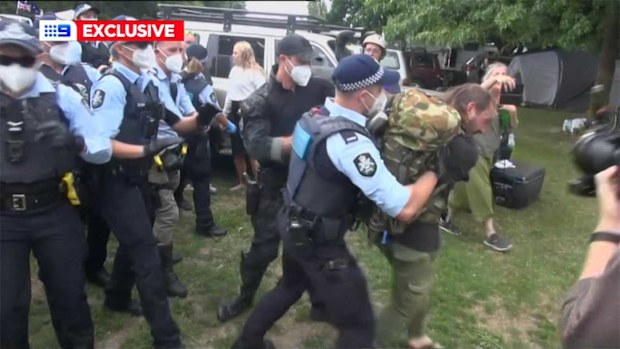 The protesters were cleared from their campsite outside the National Library.