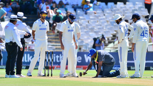 Grounds staff repair the wicket during day 2 of the 2nd Test match between South Africa and India at Newlands Cricket Ground on January 4, 2024 in Cape Town, South Africa. (Photo by Gallo Images/Getty Images)